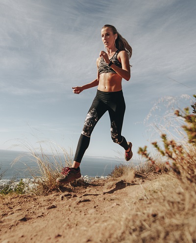 girl downhill running and the tremendous muscle damage such exwercise incurs